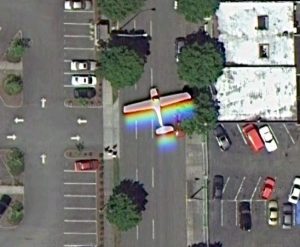 Avión percibido con efecto arcoiris por Landsat-8