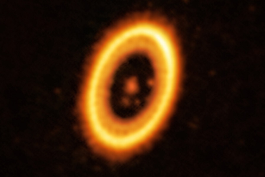 Un planeta y su troyano orbitando una estrella en el sistema PDS 70